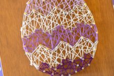 DIY purple and white Easter egg string art piece