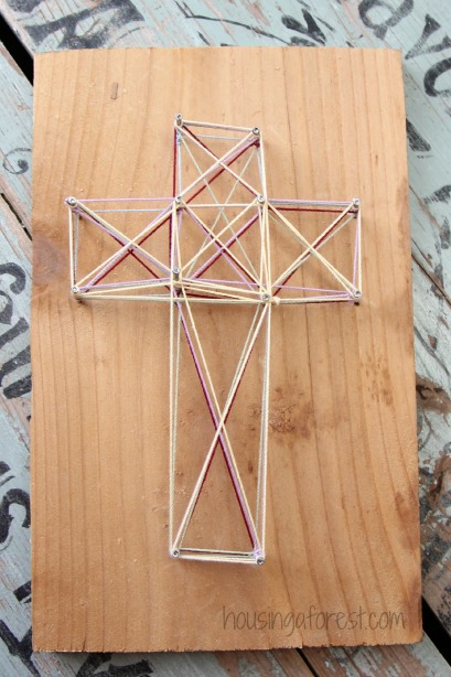 DIY string art with a cross (via www.housingaforest.com)