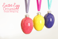 DIY glass egg ornaments filled with colorful sprinkles
