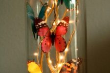 DIY magical cloche with LEDs and butterflies