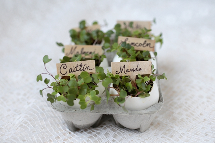 DIY egg-shaped planter place card holders for Easter (via themerrythought.com)