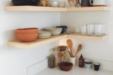03 simple wooden floating shelves in the corner create a comfy cooking nook