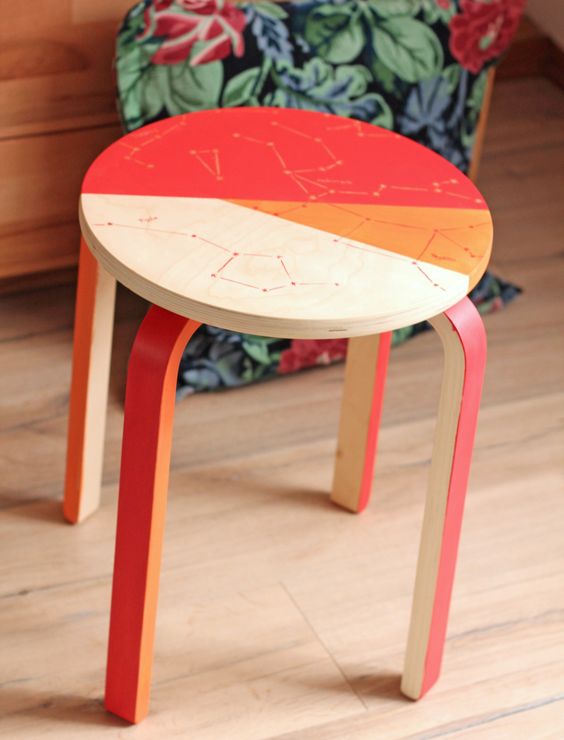 geometrically painted IKEA Frosta stool with constellations looks very edgy and bold