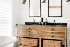 07 cool mosaic tiles on the floor and a double wooden vanity with baskets for storage