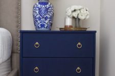 08 IKEA Rast nightstand fully covered with navy fabric for a textural look and with ring handles