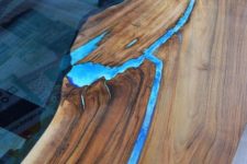 08 live edge river-inspired dining table with blue resin looks very interesting