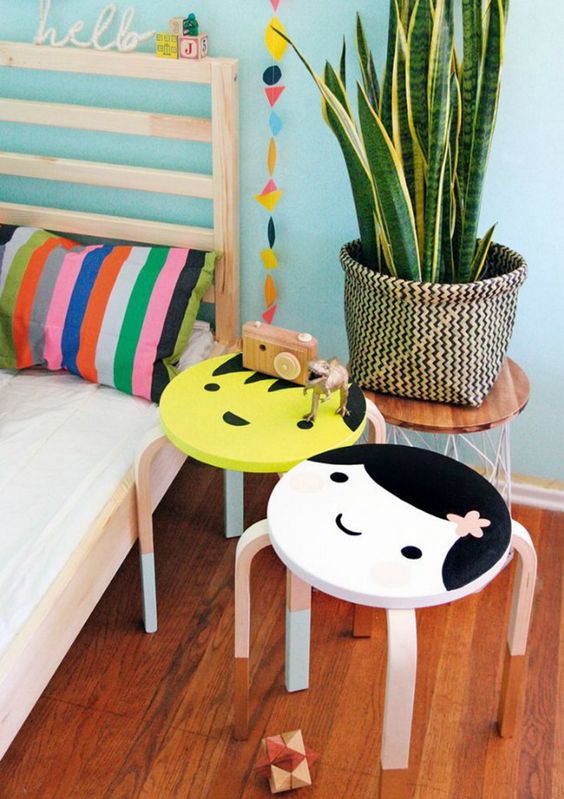 colorful painted IKEA Frosta stools for a kids' room - paint any faces and characters your kids love