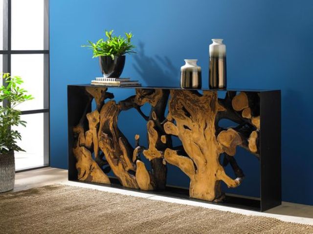 a breahttaking console table with a black metal frame, live edge wood in resin