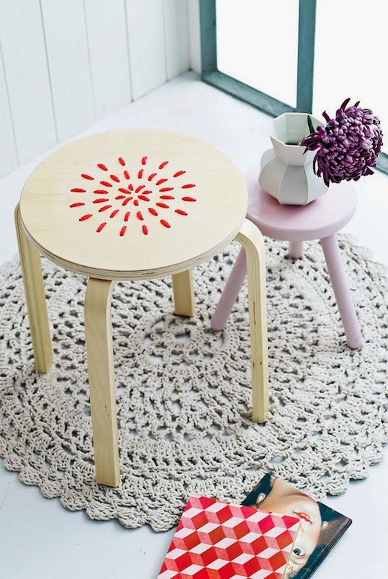 a fun painted and embroidered Frosta stool is a quirky piece for any space
