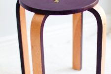 14 a bold purple Frosta stool with floral embroidery on top for a unusual touch