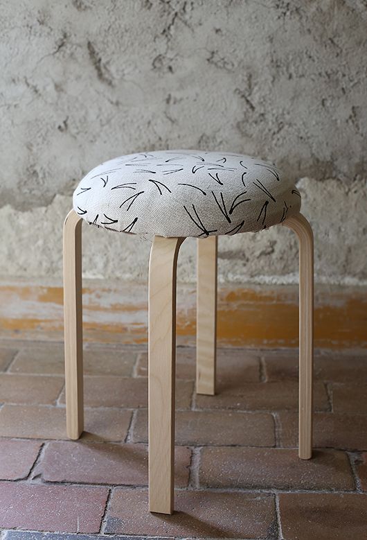 a soft cushion and printed fabric for upholstering a Frosta stool to make it comfortable