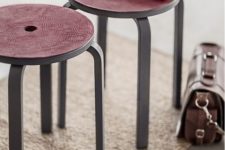 19 IKEA Frosta stools painted grey and with seats covered with fuchsia faux leather for a wow look