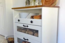 21 IKEA Rast turned into a rustic kitchen vegetable storage with two drawers and an open shelf plus a wooden countertop