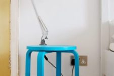 23 a bold blue IKEA Frosta stool with a shelf is a functional and colorful nightstand or side table
