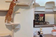 35 IKEA Frosta stools turned into a a wall cat tree – use as many as you want and create various configurations