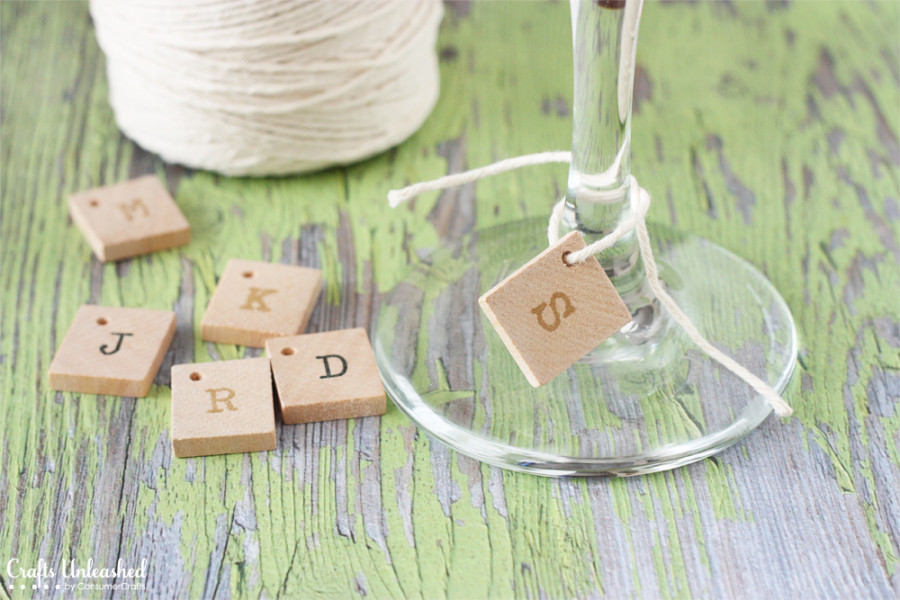 DIY stamped wood tile glass charms (via blog.consumercrafts.com)