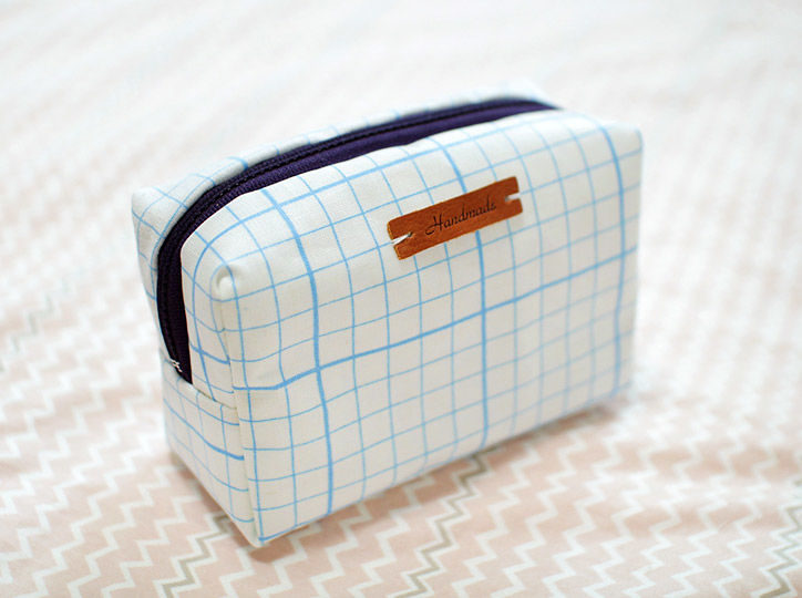 DIY toiletry bag with a leather tag