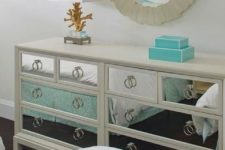 18 a super glam Hemnes hack with a mirror finish and ring pulls for a chic and shiny touch