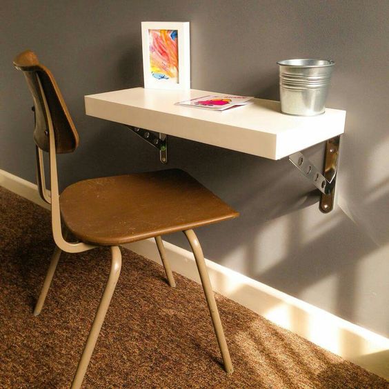 IKEA Lack shelf attached to the wall can be used as a tiny kids' desk