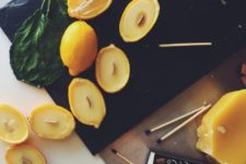 DIY lemon beeswax candles in lemon halves