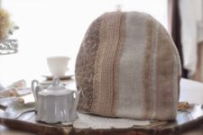 DIY tea cozy of neutral printed fabric