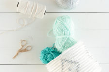 DIY white rope basket with a yarn pattern
