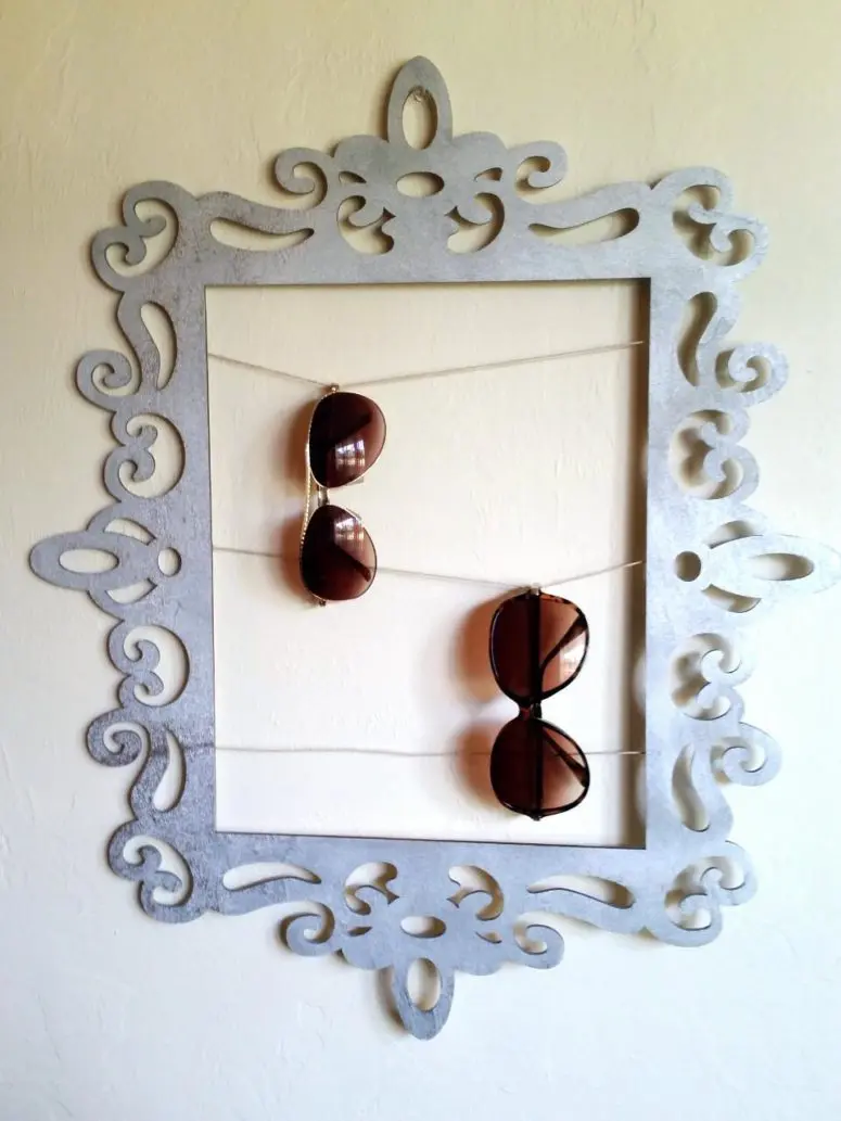 DIY refined picture frame sunglasses holder (via sweetteal.com)