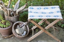 DIY folding camp chair with a stamped fabric seat