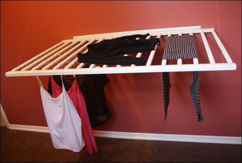 DIY wall mounted drying rack of an old crib