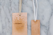 DIY whitewashed and stamped luggage tags with ribbons