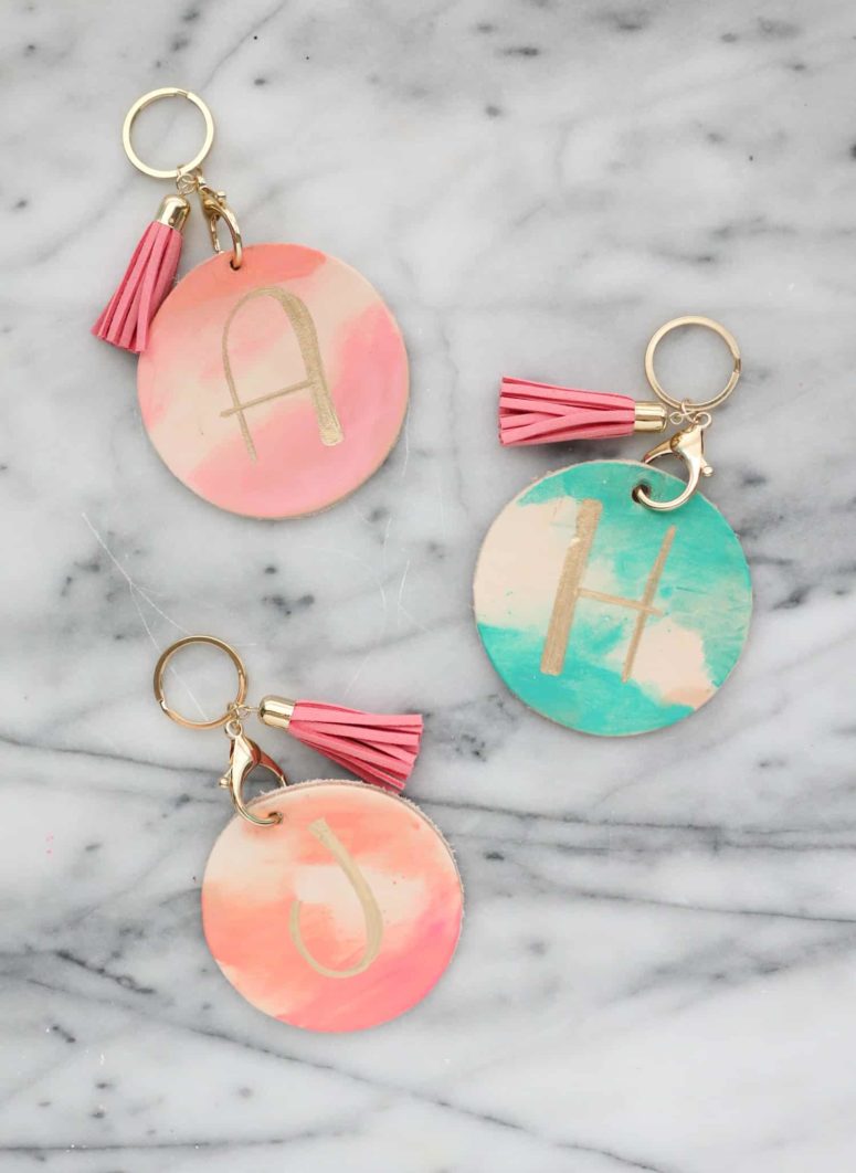 DIY watercolor round leather tags with tassels (via abeautifulmess.com)