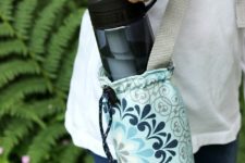 DIY water bottle carrier with a grommet