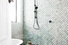 12 a neutral bathroom with an aqua tile statement wall for a seaside feel