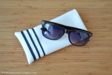 DIY white sunglasses case with blue stripes