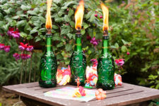 DIY bold grene beer bottle tiki torches