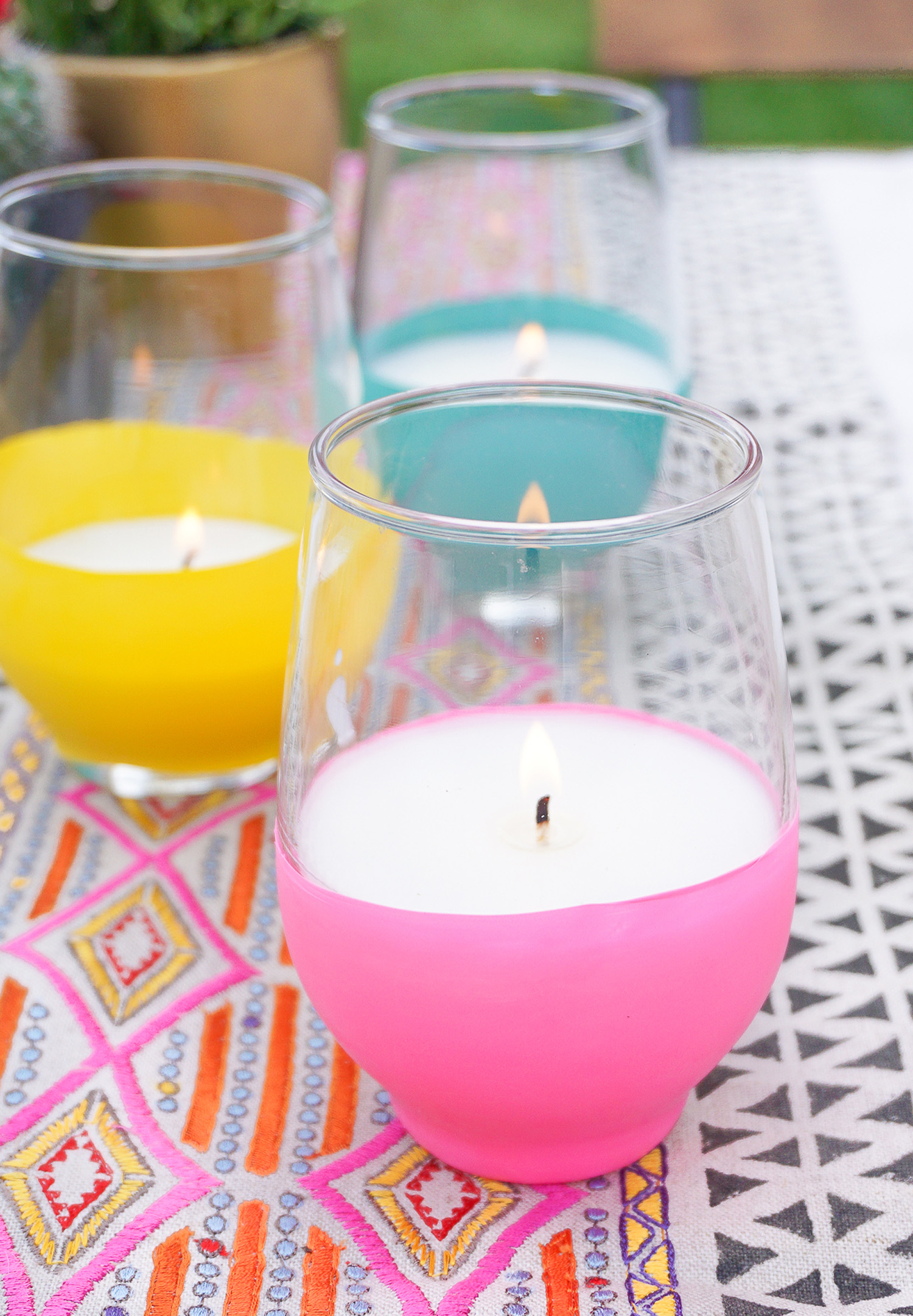 DIY balloon covered citronella candles in glasses
