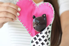 DIY black and white sunglasses case with a pink heart