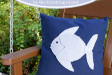 DIY navy pillow with a white fish applique