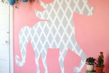 02 cut out a unicorn silhouette of old wallpaper and attach it to the wall