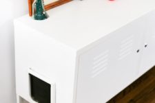 04 a cat litter box made of an IKEA metal cabinet is a smart and easy idea