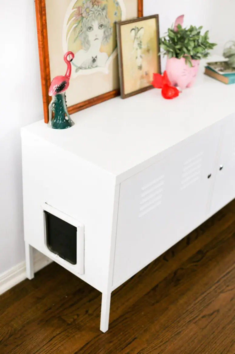 a cat litter box made of an IKEA metal cabinet is a smart and easy idea