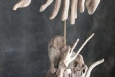 04 a fantastic fish on a stand art piece full y of driftwood is a chic idea for your coastal home
