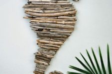 05 a sea horse artwork of driftwood is a great decor idea for any beach space