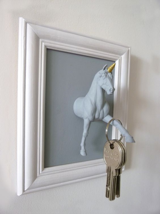 a unicorn key holder in a frame is a fun idea for any entryway