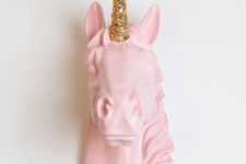 07 a pink unicorn head with a gold glitter horn is a cute and glam decoration