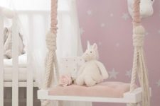 08 a faux unicorn and swan head on the wall will make your kids’ nursery amazing