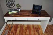 09 a Micke desk with chic silver handles and a wood clad tabletop