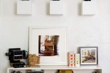 09 white cube shelves will add dimension and will display your cameras at their best