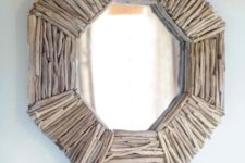 10 a chic hexagon-shaped driftwood mirror for a coastal entryway or bathroom