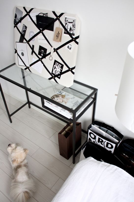 a black Vittsjo desk is a comfy nightstand that features much storage space and doesn't look bulky